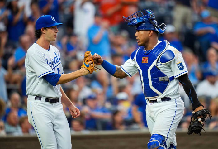 Aug 17, 2021; Kansas City, Missouri, USA; Kansas City Royals starting pitcher Daniel Lynch (52) celebrates with Kansas City Royals catcher Salvador Perez (13) after the third inning against the Houston Astros at Kauffman Stadium. Mandatory Credit: Jay Biggerstaff-USA TODAY Sports